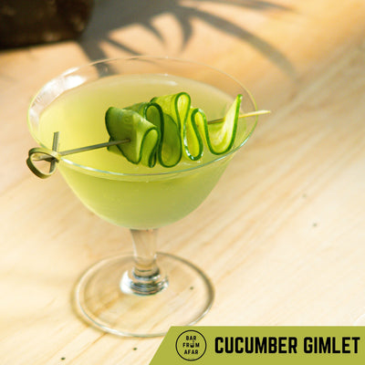 Cucumber Gimlet in a glass with a slice of cucumber as the garnish 